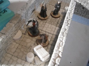 Hirst Arts Modular Dungeon.  Adventurers nervously traverse the dungeon.
